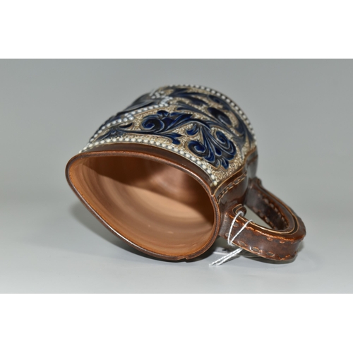 403 - A DOULTON LAMBETH COMMEMORATIVE JUG FOR CHARLES I, incised and relief faux leather and foliate decor... 