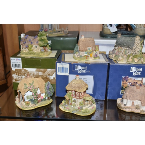 405 - A COLLECTION OF TWENTY TWO LILLIPUT LANE SCULPTURES, comprising Britain's Heritage Tower Bridge L221... 
