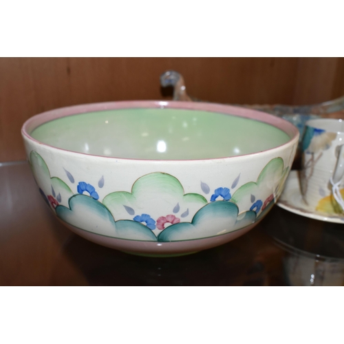 410 - A  GROUP OF CLARICE CLIFF AND SHORTER & SONS POTTERY, comprising a 'Clouds' design bowl, pink and gr... 
