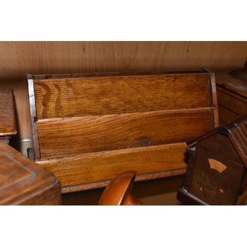 412 - A COLLECTION OF TREEN, comprising two darning mushrooms, a needle case (missing lid and split), an o... 