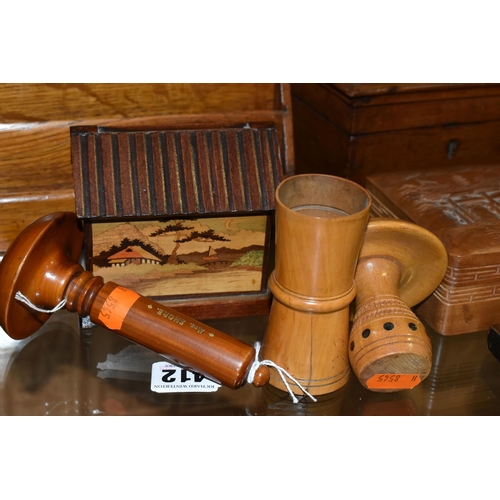 412 - A COLLECTION OF TREEN, comprising two darning mushrooms, a needle case (missing lid and split), an o... 