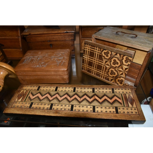 412 - A COLLECTION OF TREEN, comprising two darning mushrooms, a needle case (missing lid and split), an o... 