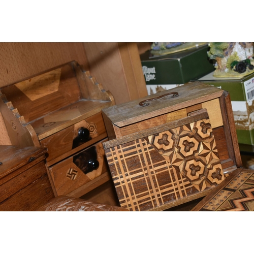 412 - A COLLECTION OF TREEN, comprising two darning mushrooms, a needle case (missing lid and split), an o... 