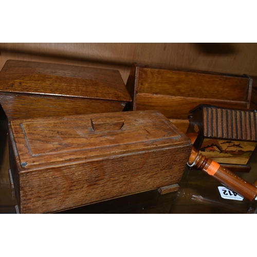 412 - A COLLECTION OF TREEN, comprising two darning mushrooms, a needle case (missing lid and split), an o... 