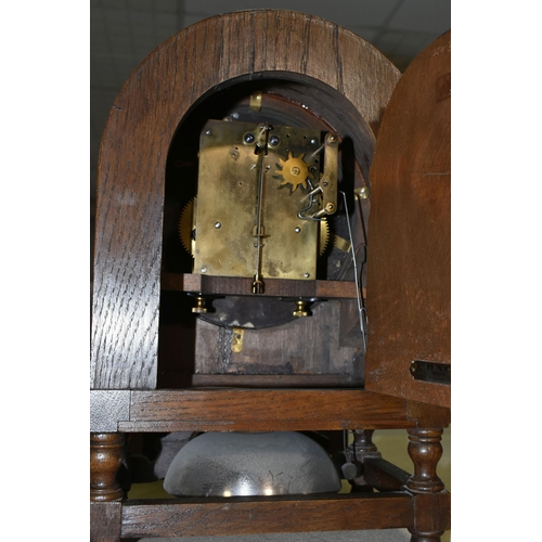 420 - A GROUP OF CLOCKS AND FIGURAL LAMP BASES, comprising a pocket watch and stand, the continental pocke... 