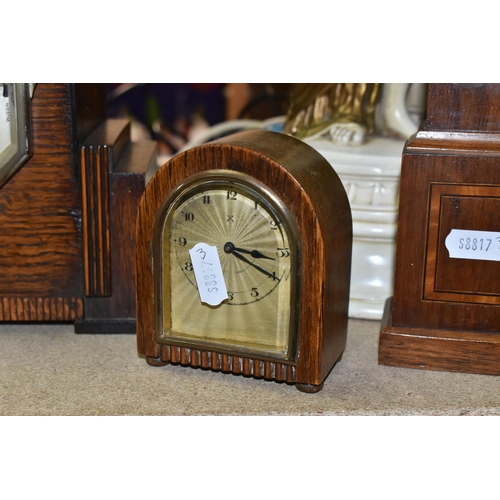 420 - A GROUP OF CLOCKS AND FIGURAL LAMP BASES, comprising a pocket watch and stand, the continental pocke... 