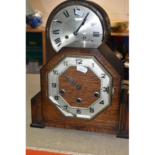 420 - A GROUP OF CLOCKS AND FIGURAL LAMP BASES, comprising a pocket watch and stand, the continental pocke... 