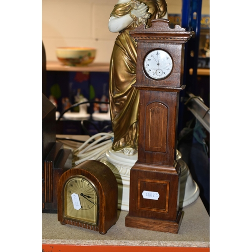 420 - A GROUP OF CLOCKS AND FIGURAL LAMP BASES, comprising a pocket watch and stand, the continental pocke... 