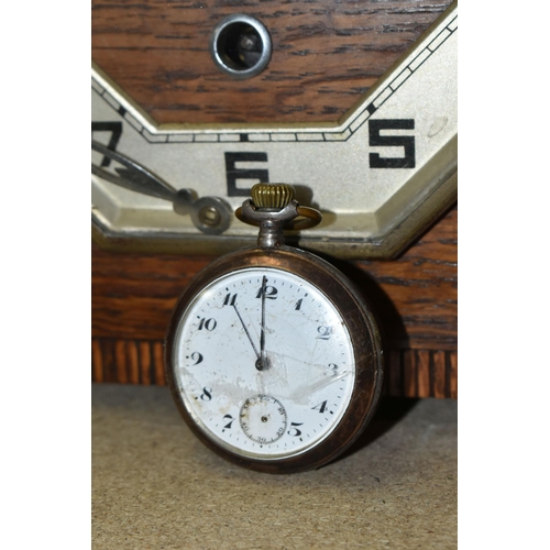 420 - A GROUP OF CLOCKS AND FIGURAL LAMP BASES, comprising a pocket watch and stand, the continental pocke... 