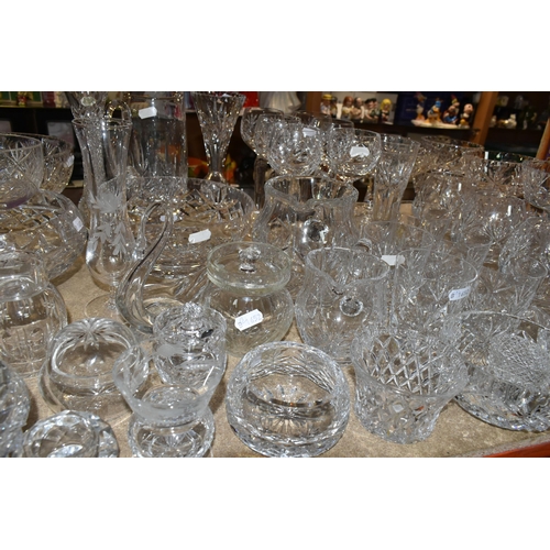424 - A GROUP OF CUT CRYSTAL AND OTHER GLASS WARE, approximately fifty to sixty pieces to include four set... 