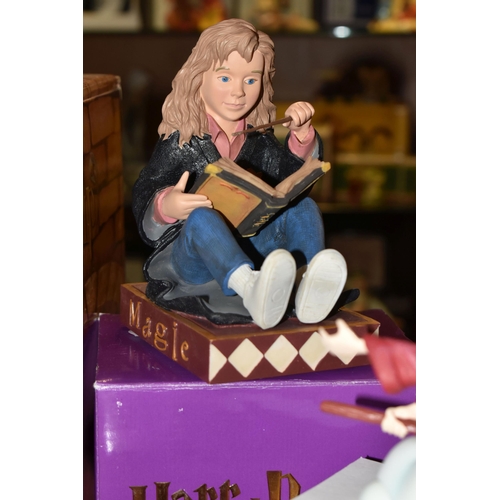 425 - A GROUP OF BOXED ENESCO HARRY POTTER ITEMS, comprising a Harry Potter cookie jar (glasses loose), Ha... 