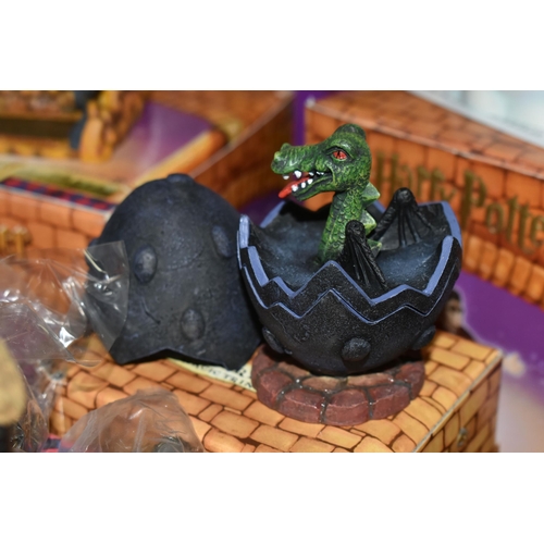 425 - A GROUP OF BOXED ENESCO HARRY POTTER ITEMS, comprising a Harry Potter cookie jar (glasses loose), Ha... 