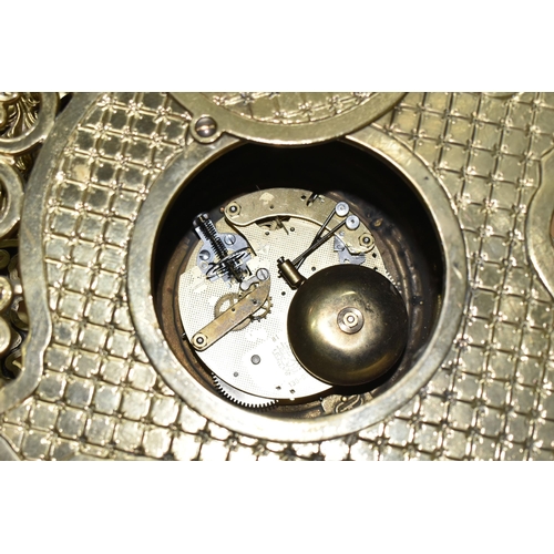 433 - A BRASS FRANZ HERMLE CLOCK GARNITURE, the clock having a chapter ring inset with enamel Roman Numera... 