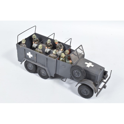 10 - A BRASS KIT BUILT MODEL OF A WWII GERMAN ARMY LORRY, has been constructed and finished to a good sta... 