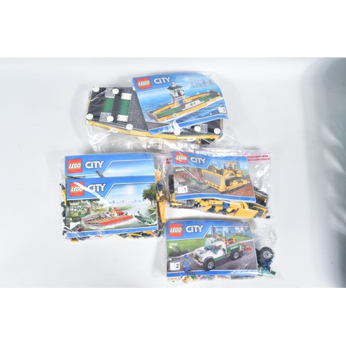 14 - A COLLECTION OF ELEVEN UNBOXED LEGO CITY MODELS, each individually sealed with some models built, ot... 