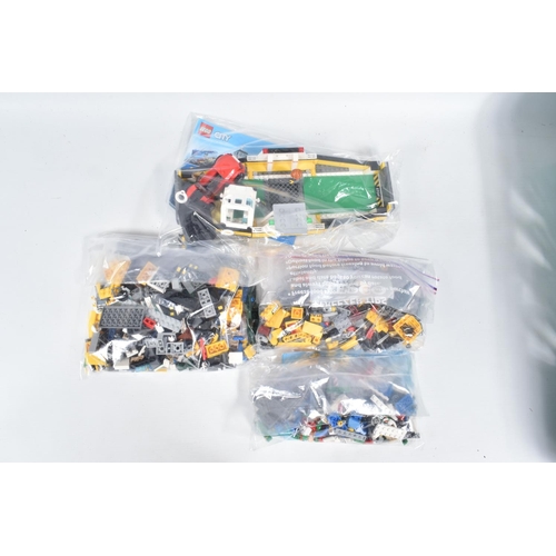 14 - A COLLECTION OF ELEVEN UNBOXED LEGO CITY MODELS, each individually sealed with some models built, ot... 