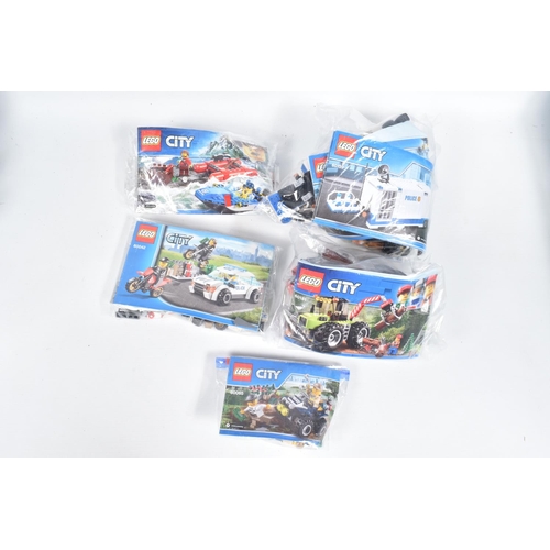 15 - A COLLECTION OF TWELVE UNBOXED LEGO CITY MODELS, each individually sealed with some models built, ot... 