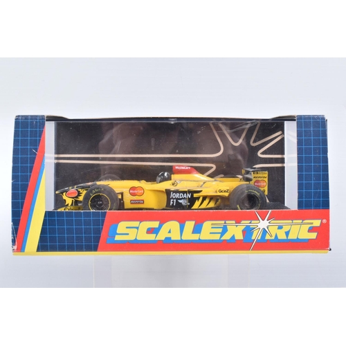 24 - A QUANTITY OF BOXED AND UNBOXED SCALEXTRIC CARS AND MOTORBIKES, boxed McLaren Mercedes MP4/10, RN10 ... 