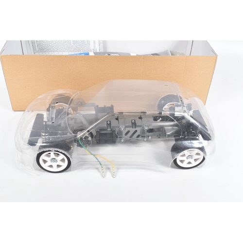 27 - A BOXED TAMIYA PEUGEOT 306 MAXI WRC 1:10 SCALE R/C FWD RACING CAR, FF02, item 58224 9800, outer box ... 