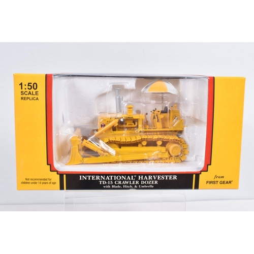 5 - EIGHT BOXED MODEL CONSTRUCTION VEHICLES, the first a First Gear 1:50 scale TD-15 Crawler Dozer, numb... 