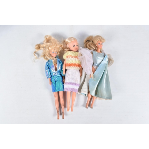 159 - A QUANTITY OF UNBOXED AND ASSORTED DOLLS, to include Sindy (two marked 033055X to back on neck and o... 