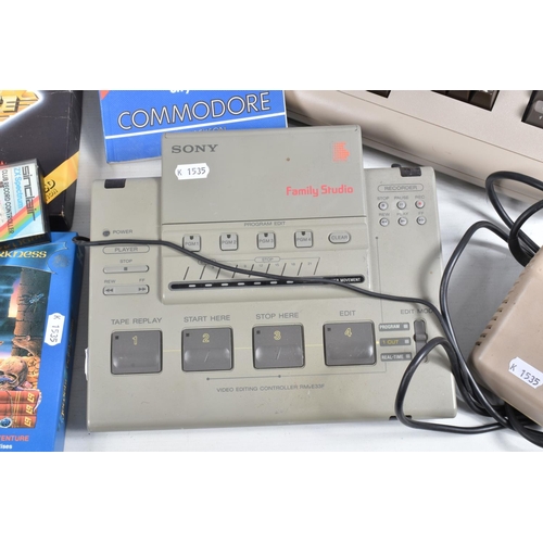 179 - A COMMODORE 64 COMPUTER, TAPE PLAYERS AND A SMALL QUANTITY OF GAMES, games include Club Record Contr... 