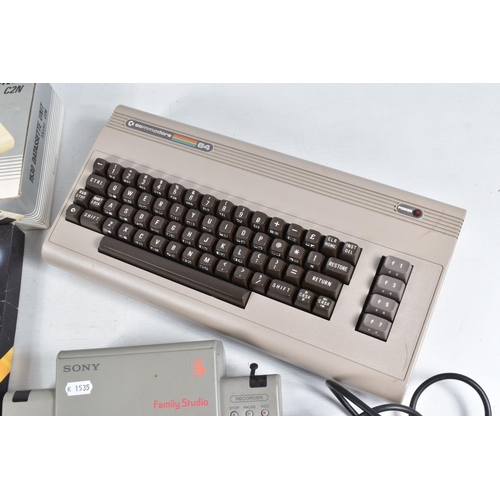 179 - A COMMODORE 64 COMPUTER, TAPE PLAYERS AND A SMALL QUANTITY OF GAMES, games include Club Record Contr... 