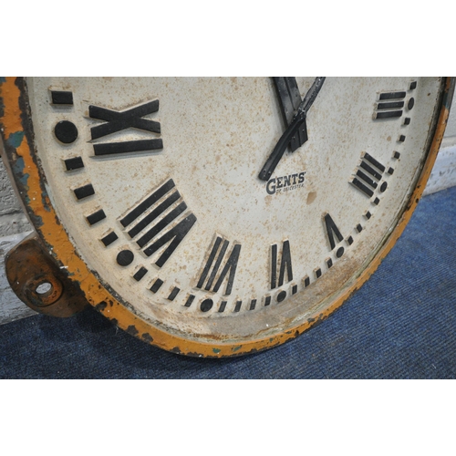 1205 - A GENTS OF LEICESTER CAST IRON WALL CLOCK, mains electric movement, orange painted border with three... 