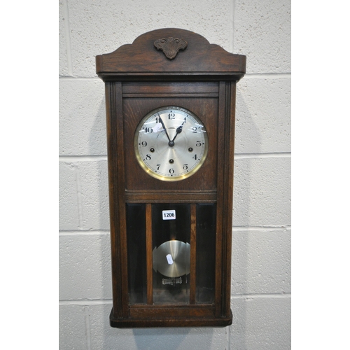 1206 - AN EARLY 20TH CENTURY OAK WALL CLOCK, height 76cm (condition report: scuffs and scratches) (two wind... 