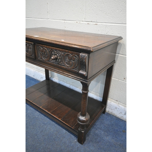 1207 - A REPRODUCTION OAK SIDE TABLE, with two drawers, on turned bulbous legs, united by an undershelf, wi... 