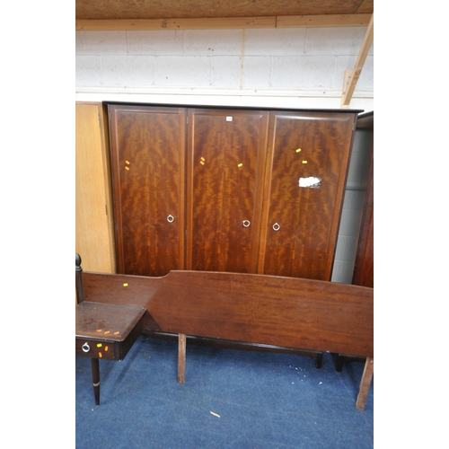 1213 - A STAG MINSTREL BEDROOM SUITE, comprising a triple door wardrobe, width 157cm x depth 59cm x height ... 