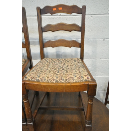 1217 - AN OAK BOOKCASE with two leaded glass cupboard doors over two smaller cupboard doors, length 109cm x... 