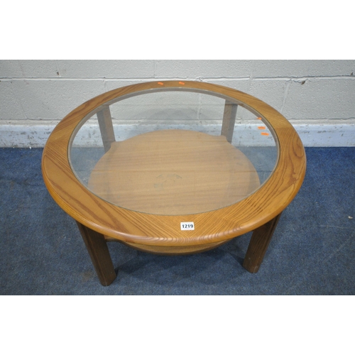 1219 - A G PLAN ASH CIRCULAR COFFEE TABLE, with a glass insert and undershelf diameter 84cm x height 44cm (... 