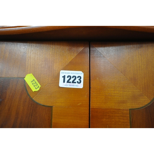 1223 - A SELECTION OF OCCASIONAL FURNITURE, to include a yew wood corner cupboard, two door cabinet, oval m... 