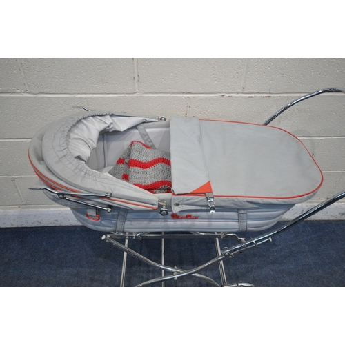 1241 - A SILVERCROSS PRAM, with grey and red basket, on tubular metal frame (condition report: some wear an... 