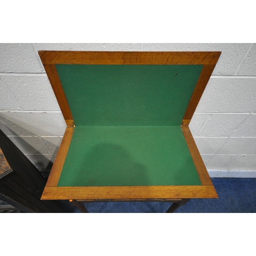 1248 - AN ARTS AND CRAFTS OAK SIDE TABLE, with a green leather inlay, above a single drawer, on cylindrical... 