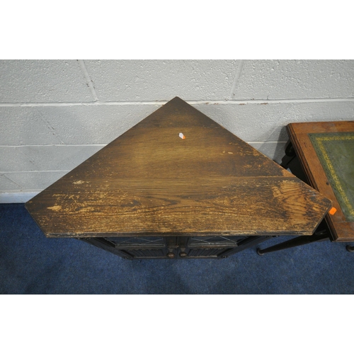 1248 - AN ARTS AND CRAFTS OAK SIDE TABLE, with a green leather inlay, above a single drawer, on cylindrical... 