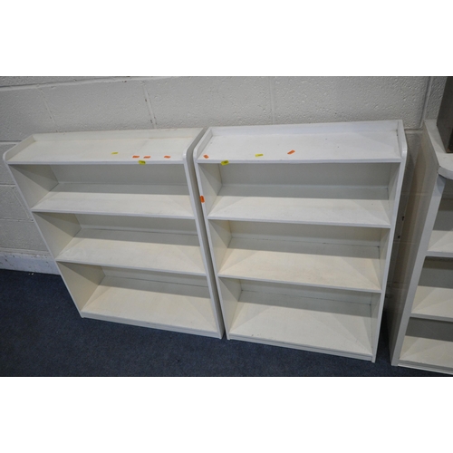 1252 - THREE WHITE PAINTED OPEN BOOKCASES, largest width 100cm x depth 30cm x height 89cm, along with a sma... 