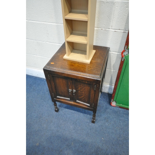 1253 - A VARIETY OF OCCASIONAL FURNITURE, to include a 20th century oak double door cupboard, 49cm squared ... 