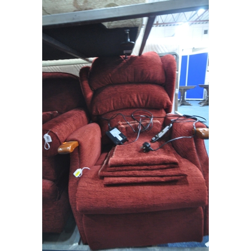 1285 - A HSL RED UPHOLSTERED DROP END TWO SEATER SOFA, along with a HSL electric rise and recline armchair ... 