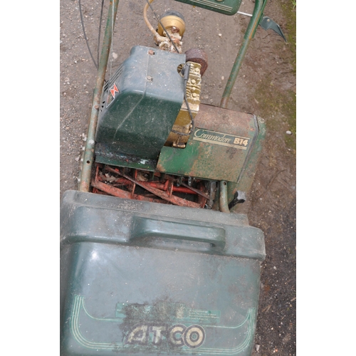 1005 - AN ATCO COMMODORE B14 PETROL LAWN MOWER with grass box (spares or repairs as missing parts but engin... 