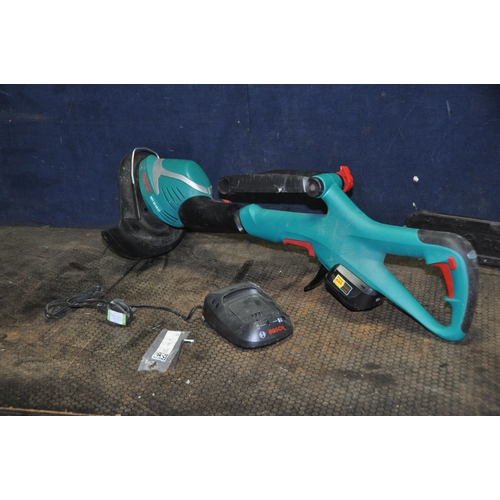 1079 - A BOSCH AKE40 ELECTRIC CHAIN SAW and a Bosch ART26-18Li cordless strimmer (no string carriage) with ... 