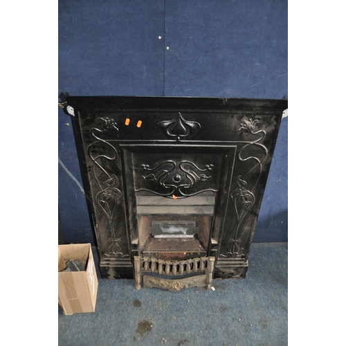 1083 - TWO CAST IRON FIRE INSERTS one with gas fire fittings in Art Nouveau style with a box of 'coals' wid... 