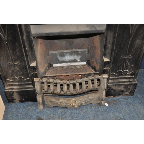 1083 - TWO CAST IRON FIRE INSERTS one with gas fire fittings in Art Nouveau style with a box of 'coals' wid... 