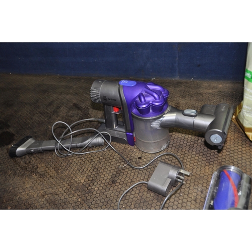 1086 - A DYSON DC34 ANIMAL HANDHELD CORDLESS VACUUM CLEANER with two attachments and charger (PAT pass and ... 