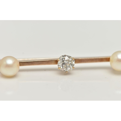 13 - A YELLOW METAL DIAMOND AND CULTURED PEARL BAR BROOCH, a principally set old cut diamond, approximate... 