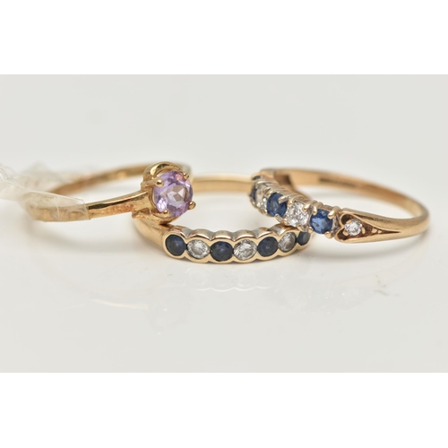 3 - THREE 9CT GOLD GEM SET RINGS, the first a sapphire and diamond half eternity ring, set with four dee... 