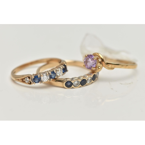 3 - THREE 9CT GOLD GEM SET RINGS, the first a sapphire and diamond half eternity ring, set with four dee... 