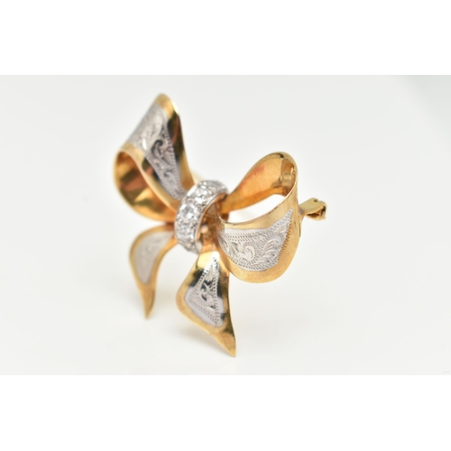 35 - A BI COLOUR DIAMOND BROOCH, designed as a yellow metal bow with white metal and engraved detail, set... 