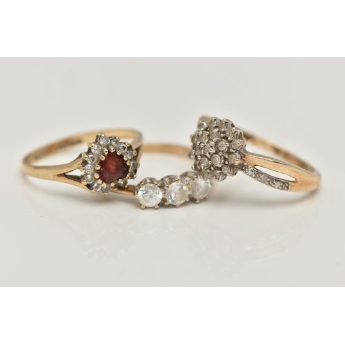 37 - THREE 9CT GOLD RINGS, the first a circular diamond cluster ring, with open work single cut diamond s... 